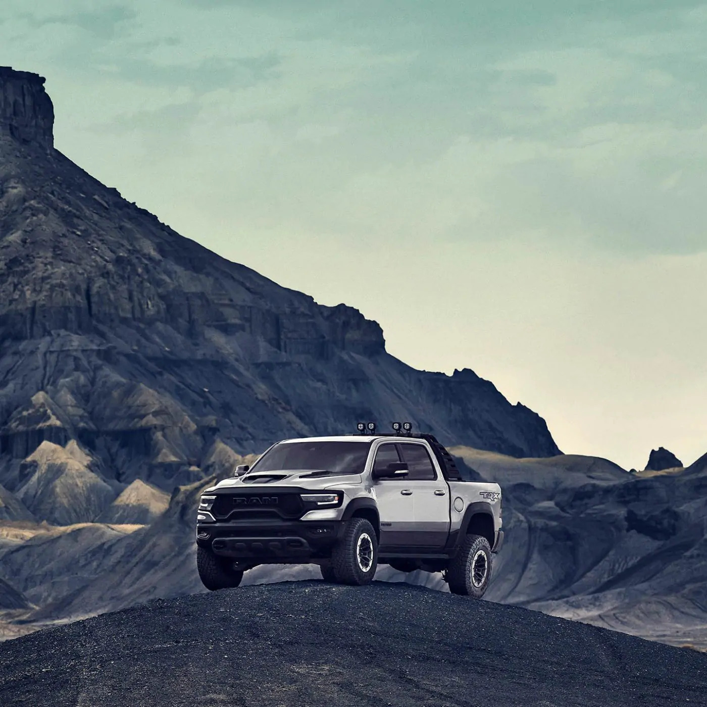 The 2021 Ram 1500 TRX parked against a mountain backdrop.