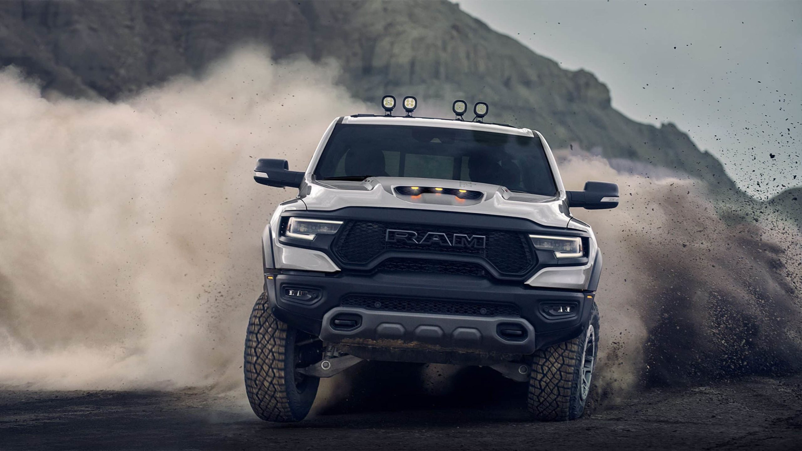 When raging off-road, TRX adapts to varied terrain with Bilstein® Black Hawk® e2 shocks and ground-breaking suspension technology. Plus, you’ll leave your mark wherever you roam with traction-focused tread on the 35-inch Goodyear Wrangler Territory All Terrain tires.